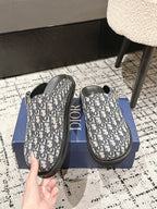 Dior slide sandals, Oblique logo canvas, black molded sole and side openings