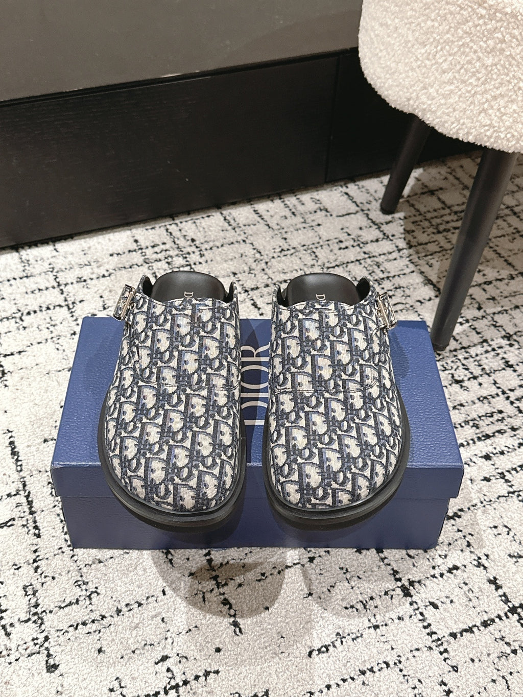 Dior slide sandals with blue-and-white Oblique print and black rubber sole