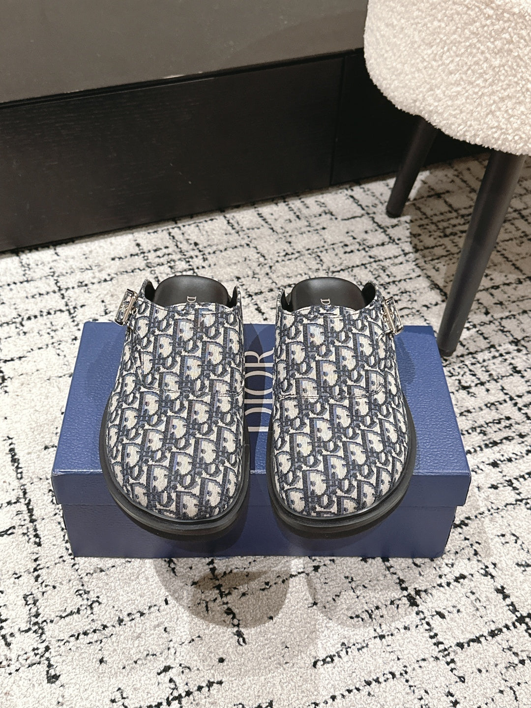 Dior slide sandals with blue-and-white Oblique print and black rubber sole