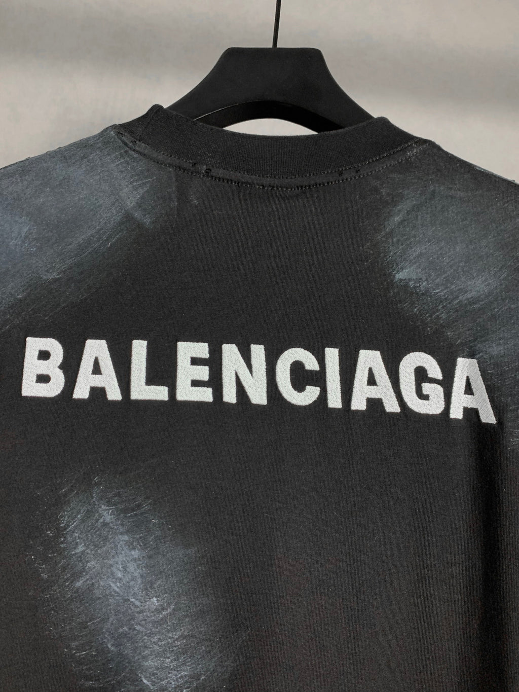 Balenciaga dark short-sleeve T-shirt with oversized front logo text
