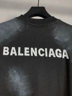 Balenciaga dark short-sleeve T-shirt with oversized front logo text