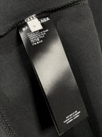 Balenciaga dark T-shirt care label inside neck seam