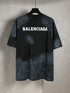 Balenciaga dark short-sleeve T-shirt with large front logo text