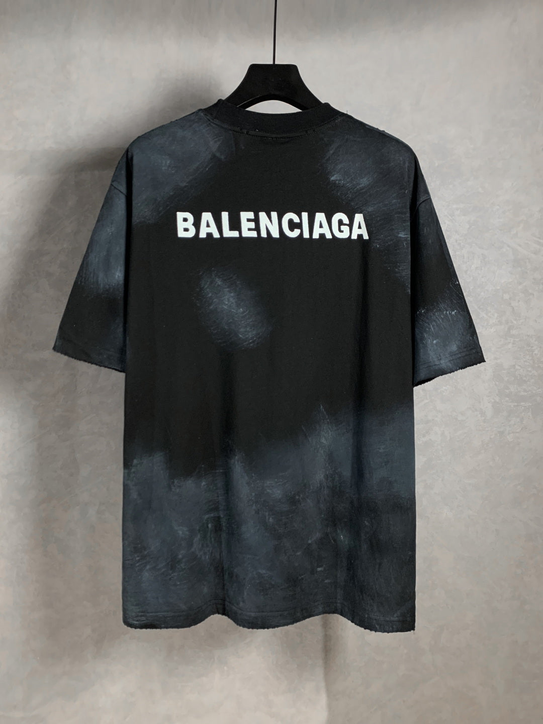 Balenciaga dark short-sleeve T-shirt with large front logo text