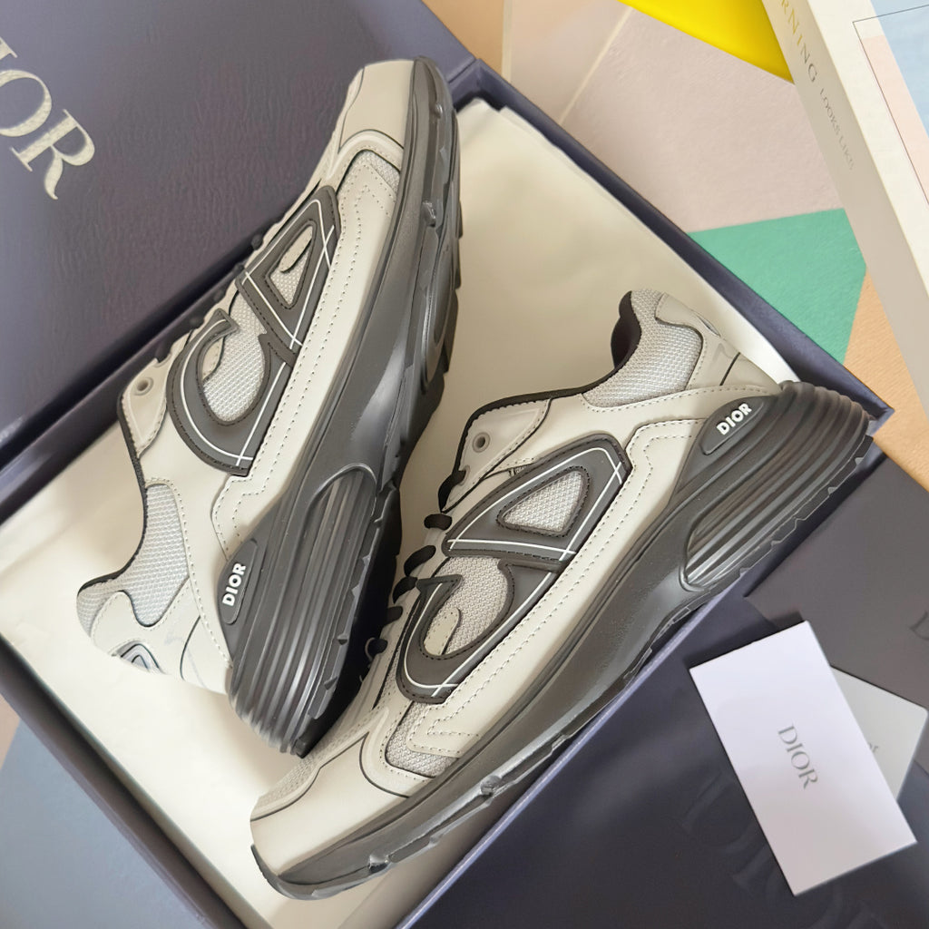 Dior unisex sneakers angled view with panel seams, dark laces, and grippy sole