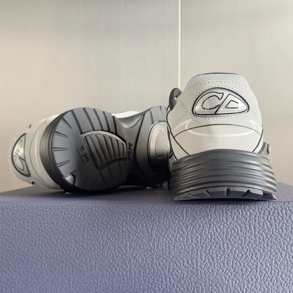 Dior unisex sneakers heel view showing textured outsole and rear logo