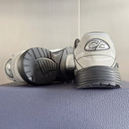 Dior unisex sneakers heel view showing textured outsole and rear logo