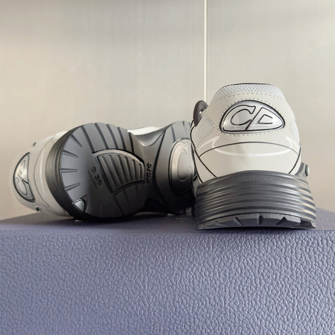 Dior unisex sneakers heel view showing textured outsole and rear logo