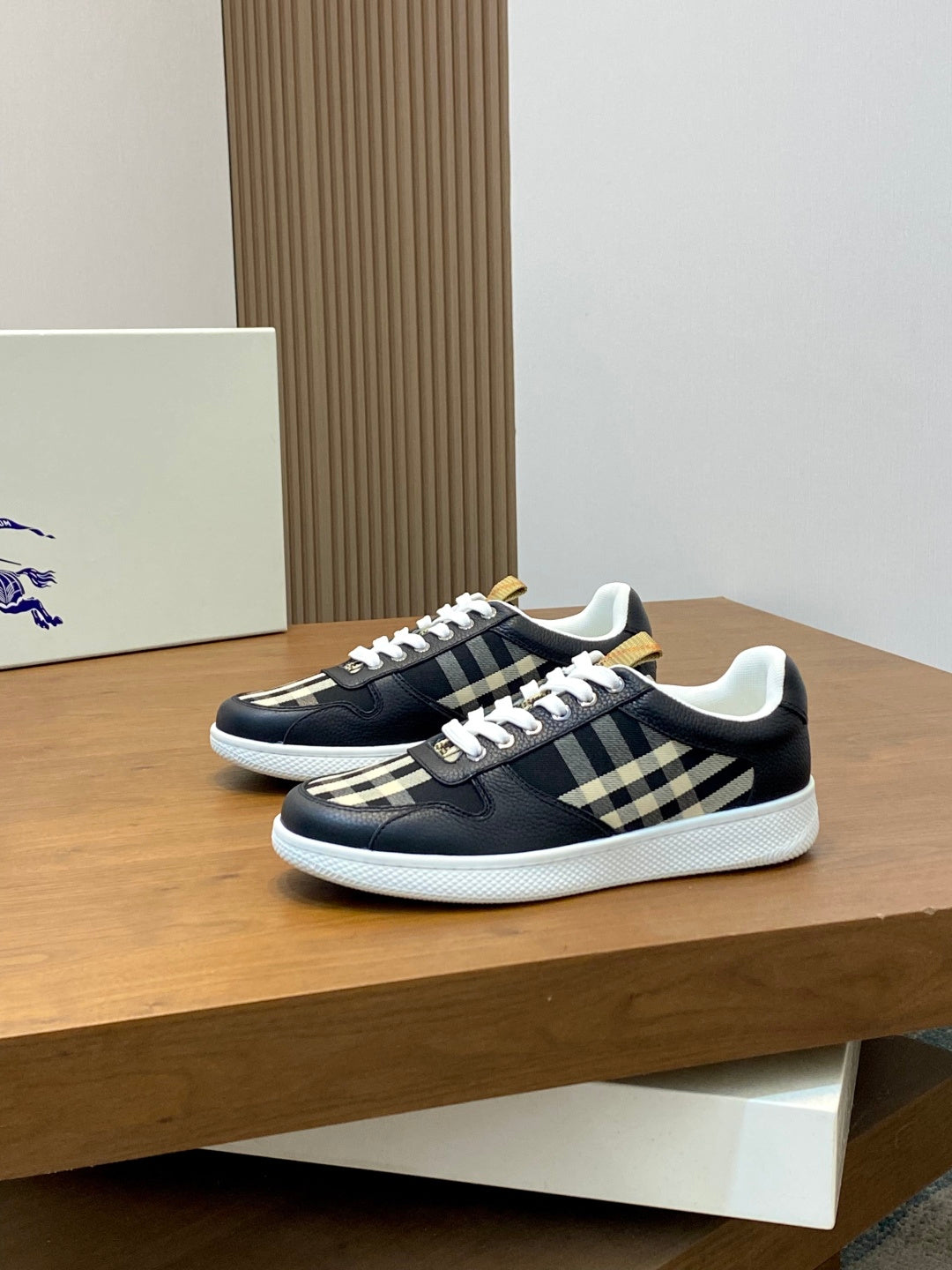 Burberry sneakers pair, navy uppers with white check insert and lace-up