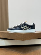 Burberry lace-up sneakers in black, check strap detail, white laces, light sole