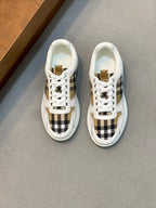 Burberry low-top sneakers in white with check panel and lace-up front