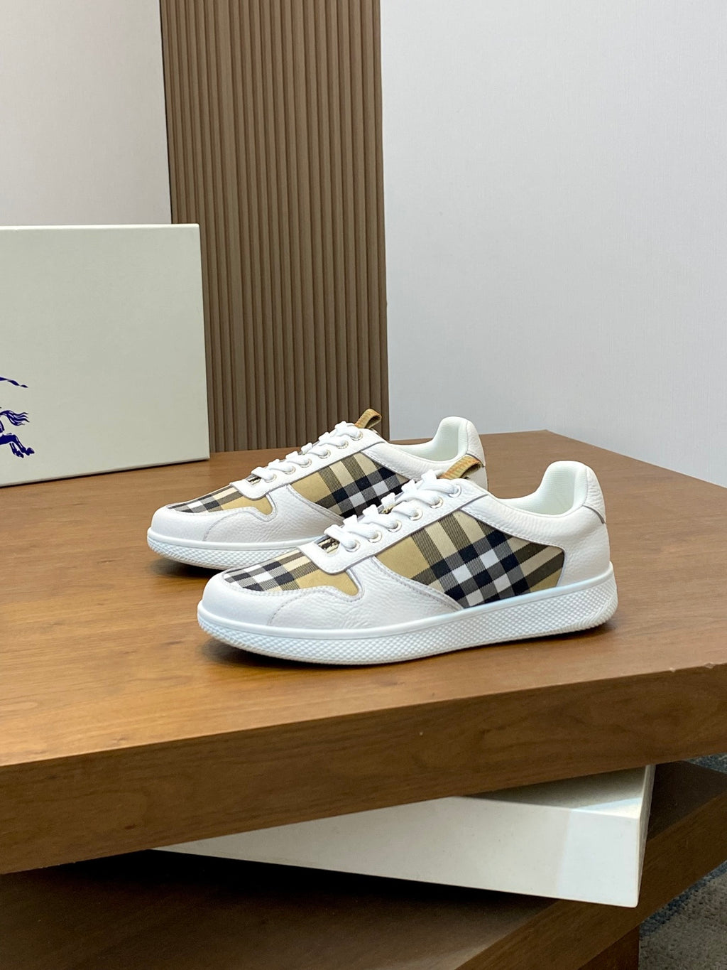 Burberry low-top sneakers with white leather and black-and-brown check strap detail