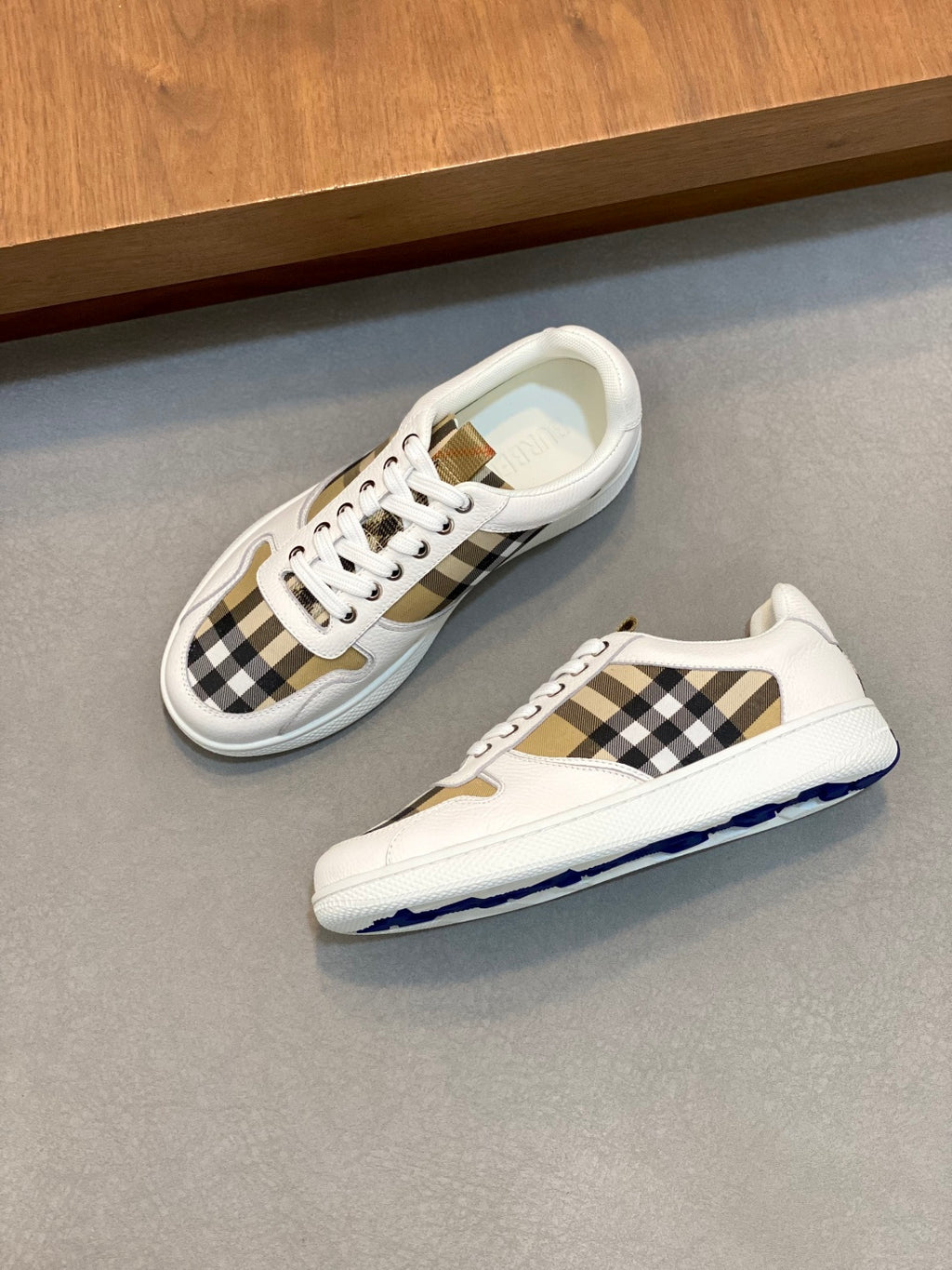 Burberry low-top sneakers set, white with black-and-brown check panels and laces