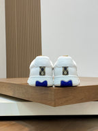 Burberry low-top sneakers, white heel with check back tab and blue sole