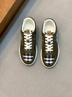 Burberry luxury sneakers in olive green with check panel and white laces