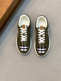 Olive low-top sneaker with white laces and black-and-white check side panel
