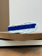 Burberry luxury sneakers outsole, white tread with blue Burberry branding