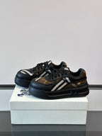 Lace-up sneakers with dark leather uppers and beige plaid stripe panel