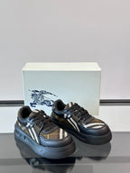 Two-tone lace-up sneakers in dark navy with beige plaid and white stripe detail