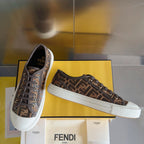 Unisex Fendi sneakers, brown FF pattern on canvas, lace-up front, white rubber sole.