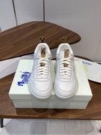 Burberry white leather sneakers with lace-up front and gold-tone heel tabs