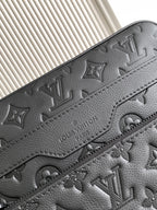 Textured leather with debossed monogram pattern and contrast stitching, dark.