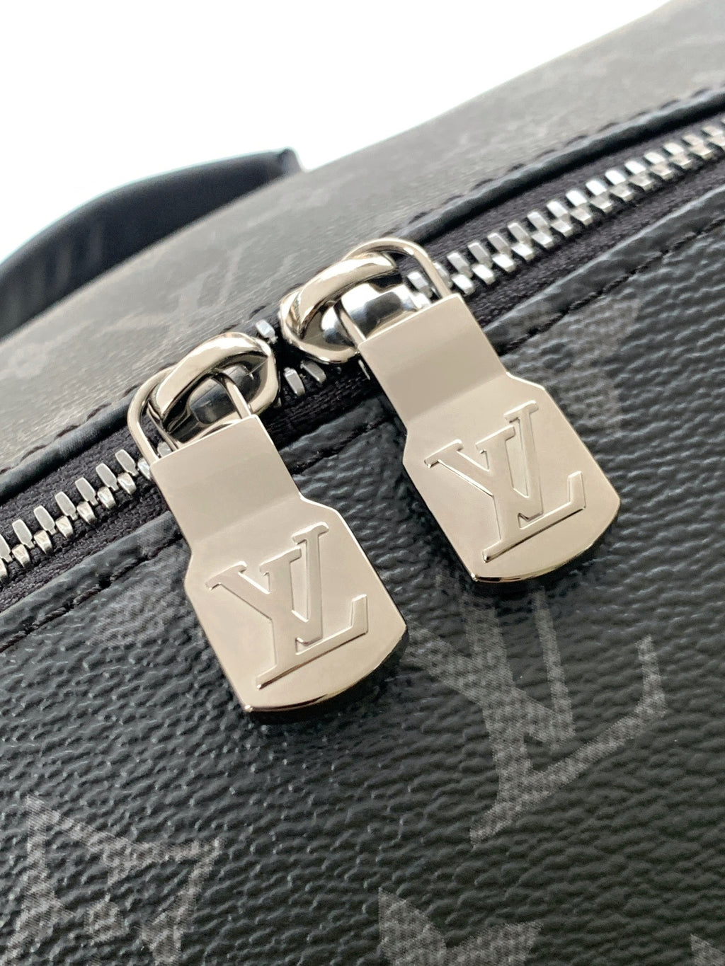Louis Vuitton monogram bag zipper pull with two LV padlock charms