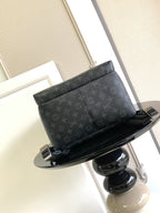 Louis Vuitton monogram backpack front view with top zipper and black trim