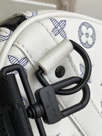 Louis Vuitton monogram bag hardware, black clasp on white leather trim