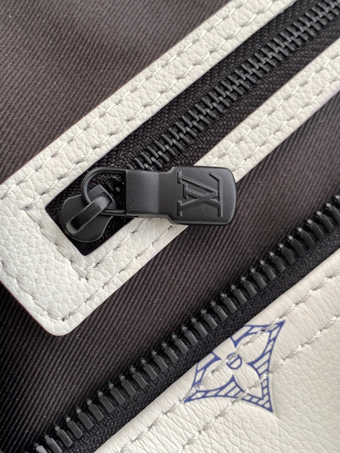 Louis Vuitton monogram bag zipper tab, black hardware with embossed mark