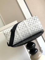 Louis Vuitton monogram duffel bag, white with black strap and handle side view