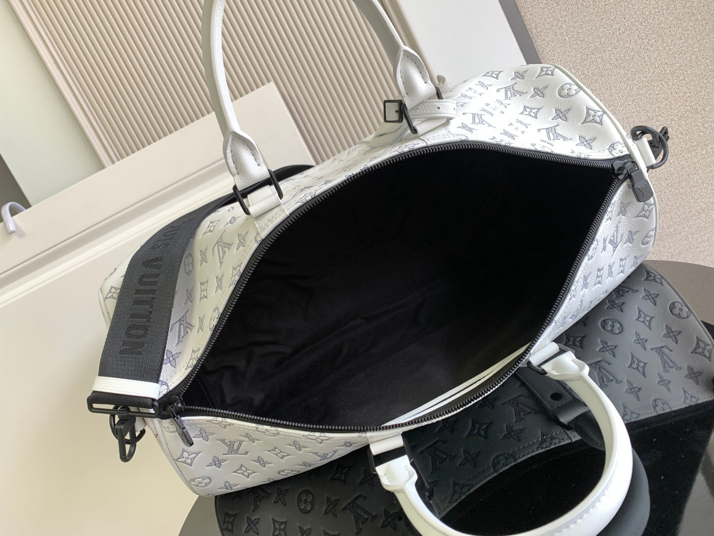 Louis Vuitton monogram bag, open top in white with black interior lining