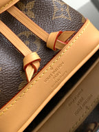 Louis Vuitton monogram bag strap with tan leather trim and engraved text