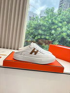 White Hermes sneakers for ladies with brown H logo, casual lace-up style