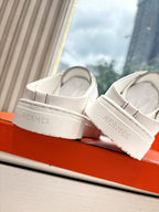 White Hermes sneakers for ladies with HERMES branding on heel strap
