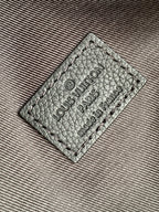 Louis Vuitton bag leather label patch with "Louis Vuitton Paris" and "made in France" text