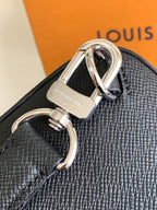 Louis Vuitton black textured leather bag with metal D-ring hardware