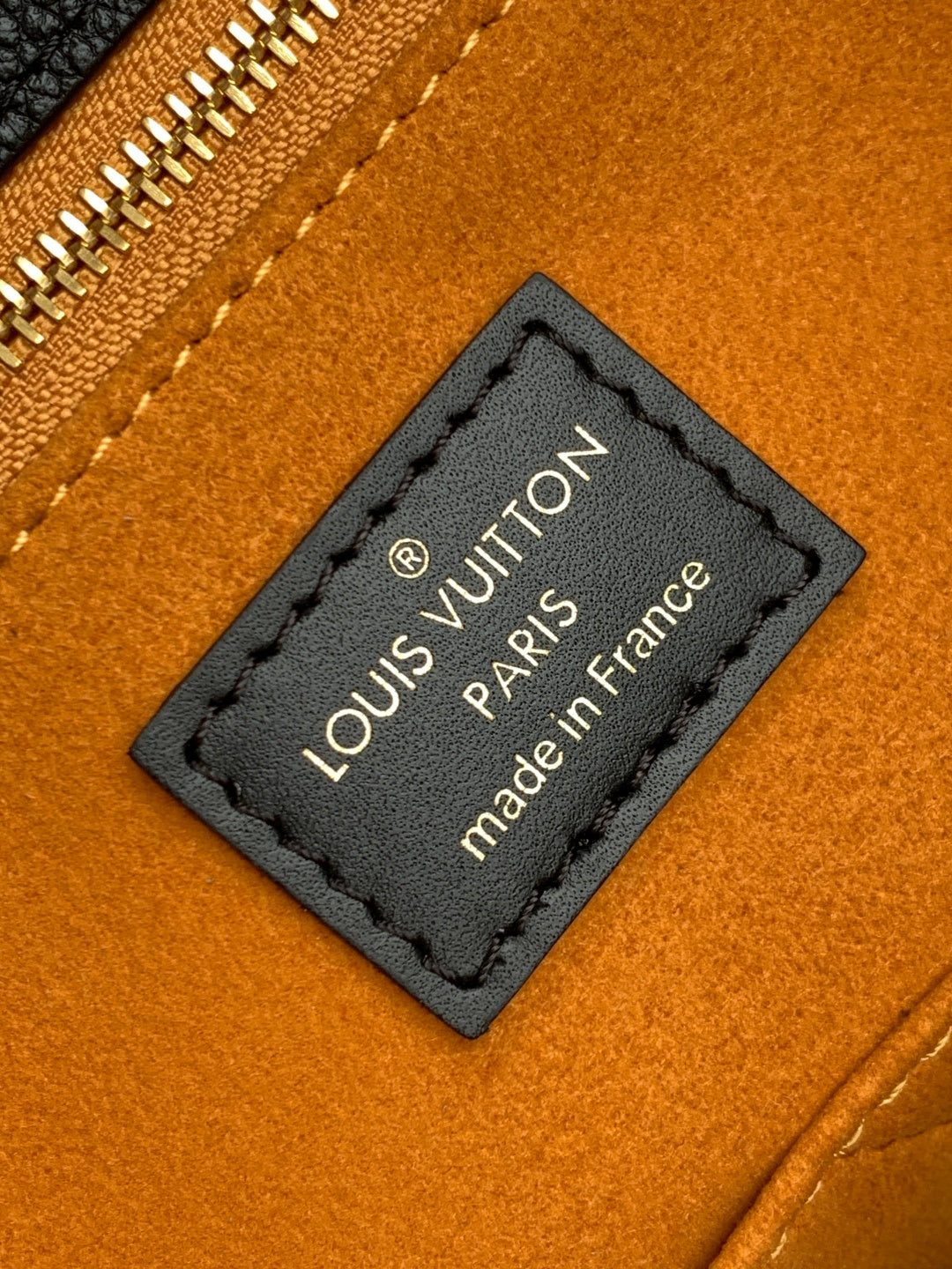 Louis Vuitton Paris made in France leather tag on tan lining