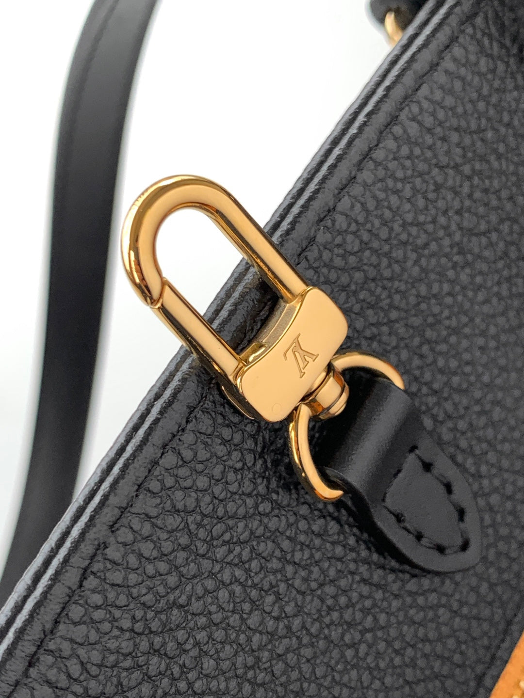 Louis Vuitton tote bag gold-tone D-ring clasp on dark leather strap