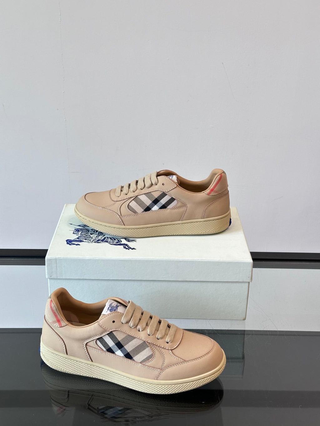 Beige lace-up sneakers with Burberry check panel details and textured sole