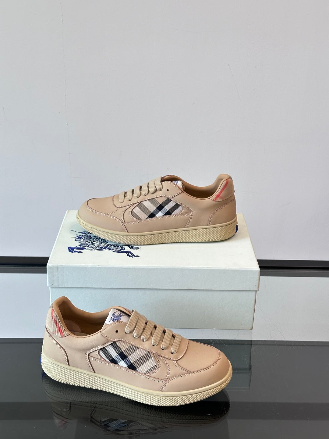 Beige lace-up sneakers with Burberry check panel details and textured sole