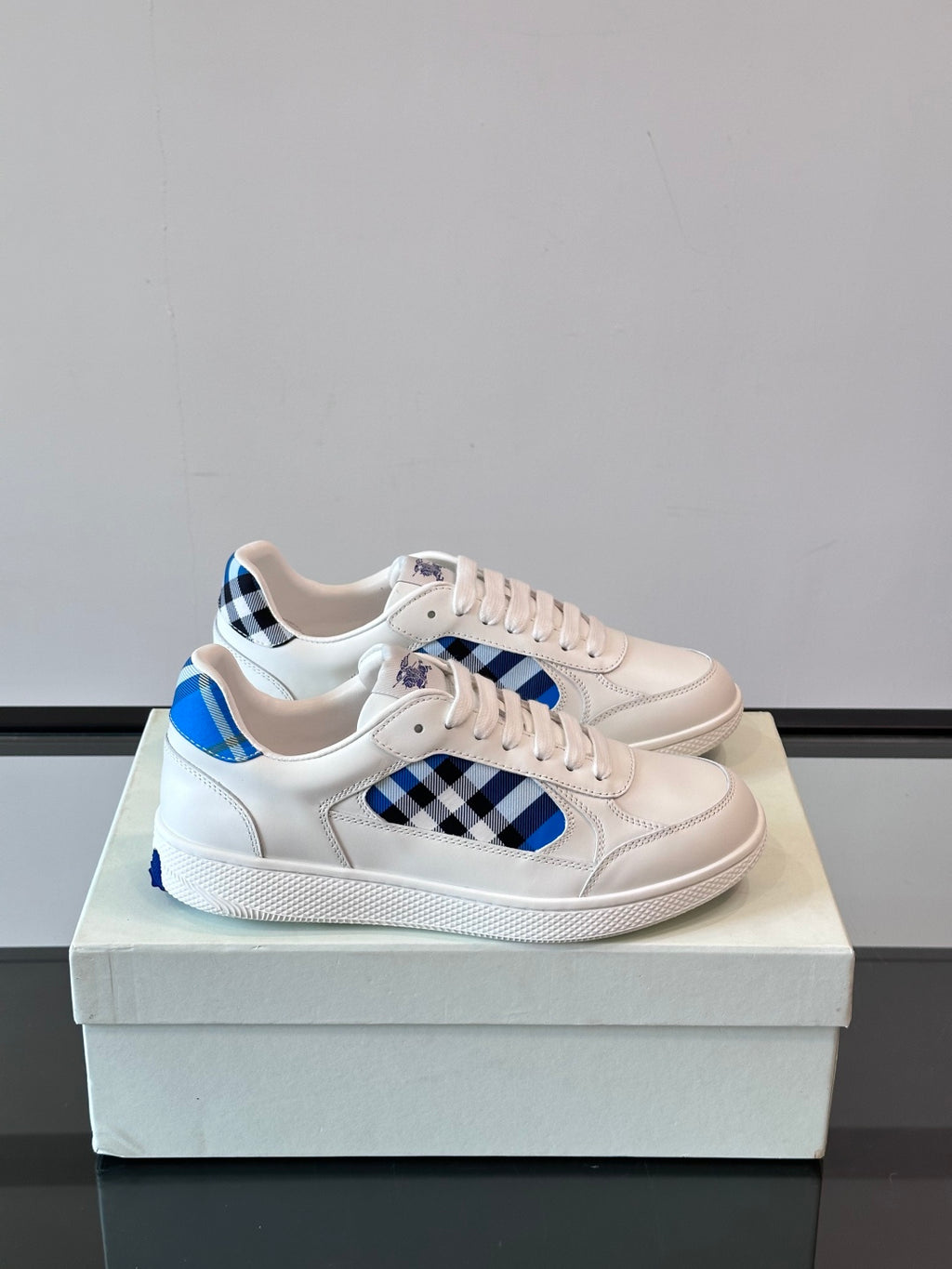 Burberry low-top sneakers, white leather with blue plaid panel and lace-up