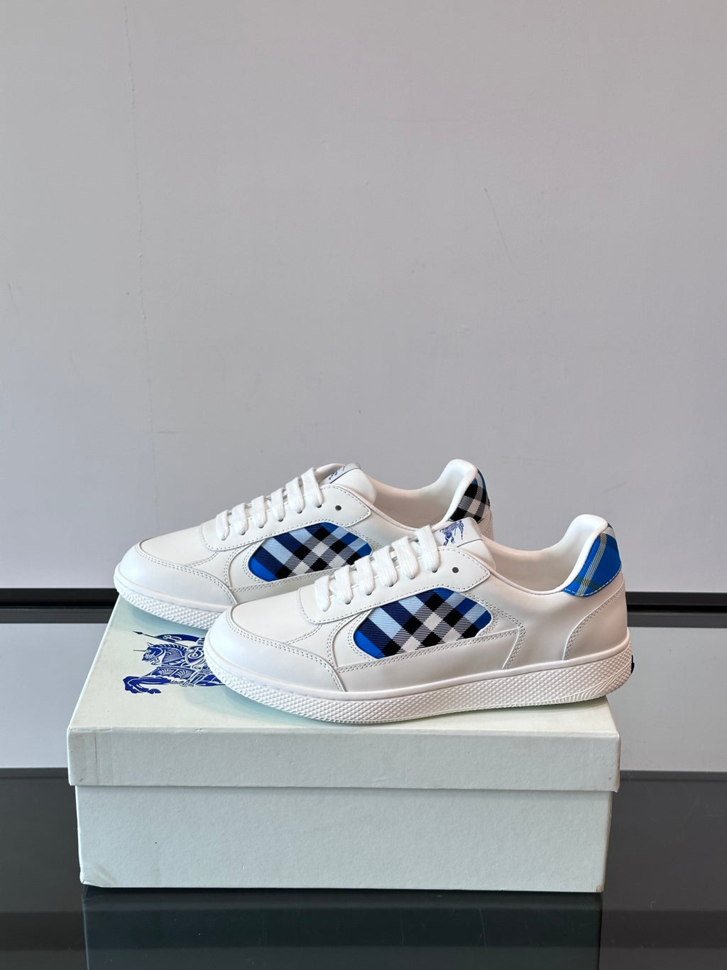 Burberry low-top sneakers, white with blue plaid side panel and lace-up