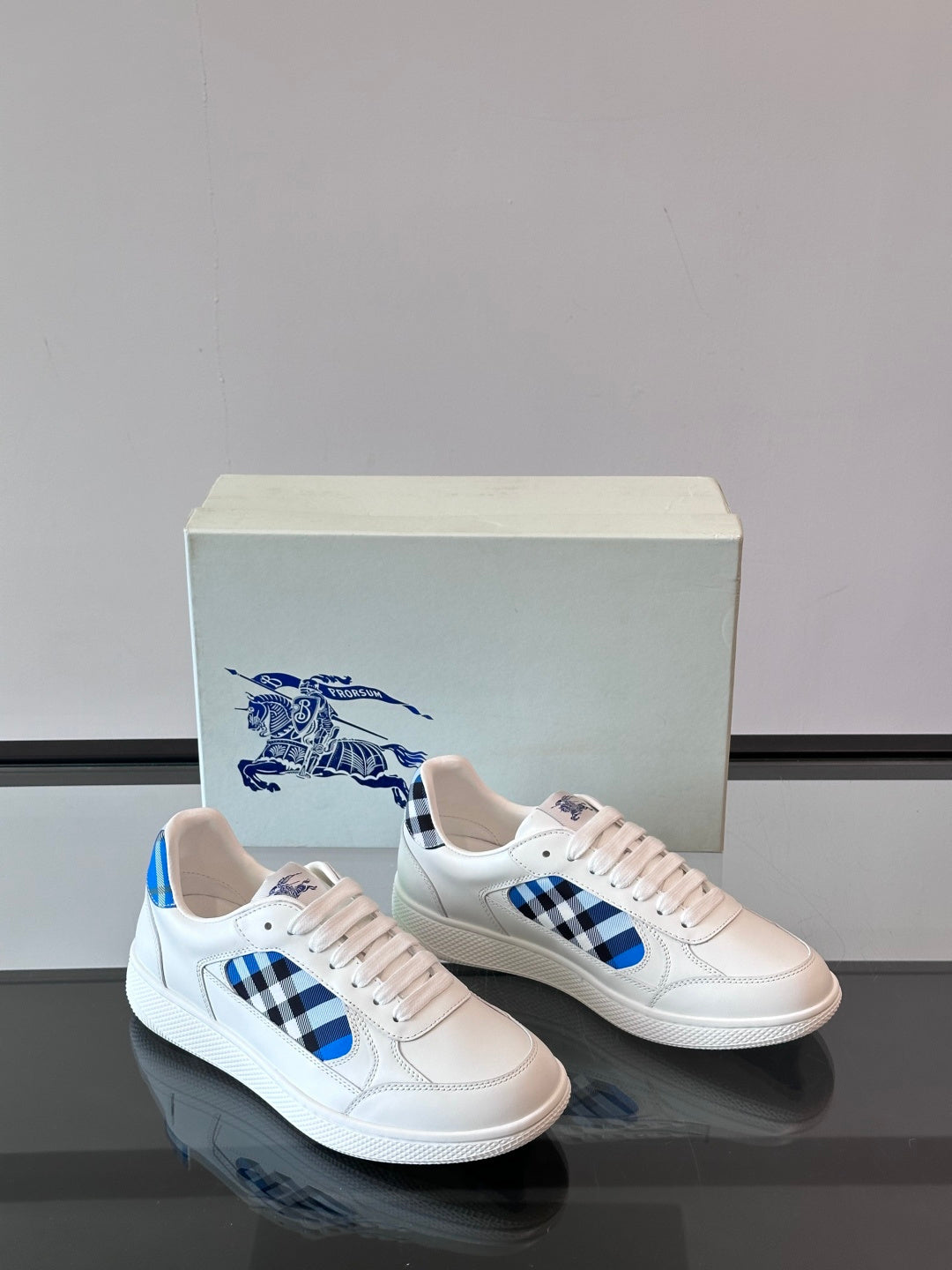 Burberry low-top sneakers, white with blue plaid inserts and textured sole