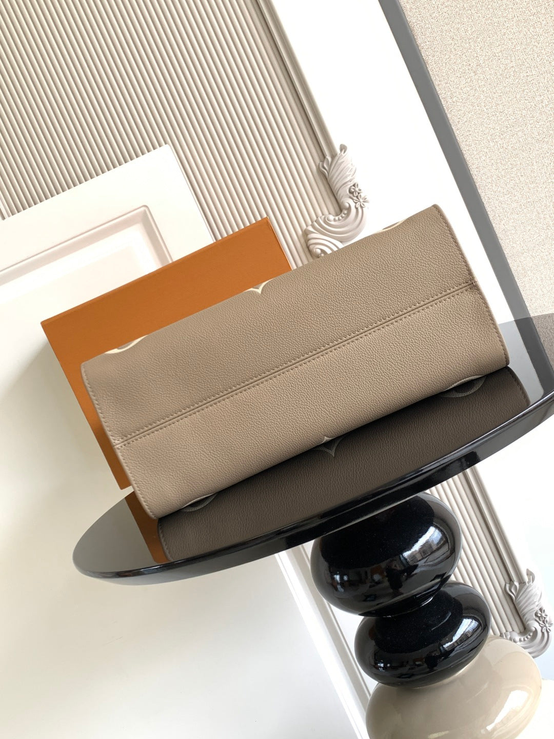 Louis Vuitton small leather bag in taupe with top fold-over flap