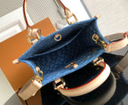 Louis Vuitton denim tote bag interior view with open top and tan lining