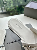 Balenciaga women's sandals, light cream footbed close-up with BALENCIAGA text