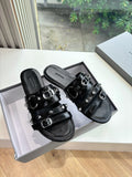 Balenciaga ladies black slide sandals with silver buckles and studded straps
