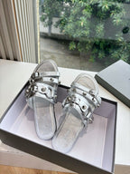 Balenciaga silver slide sandals with metallic double straps and buckle detail