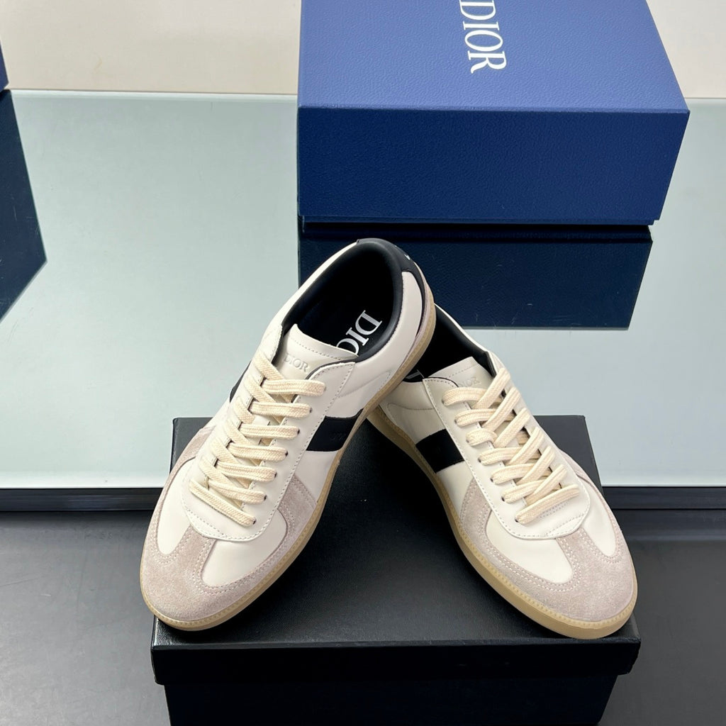 Unisex low-top sneakers pair with white laces, navy stripe, and cream outsole